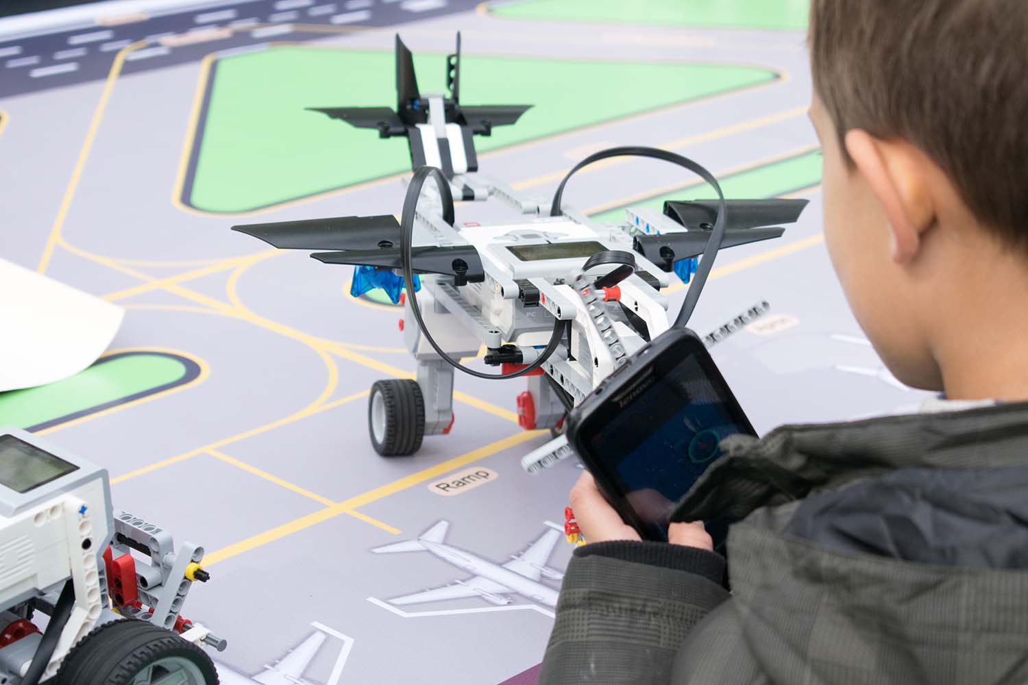 Boy Playing With Toy Plane